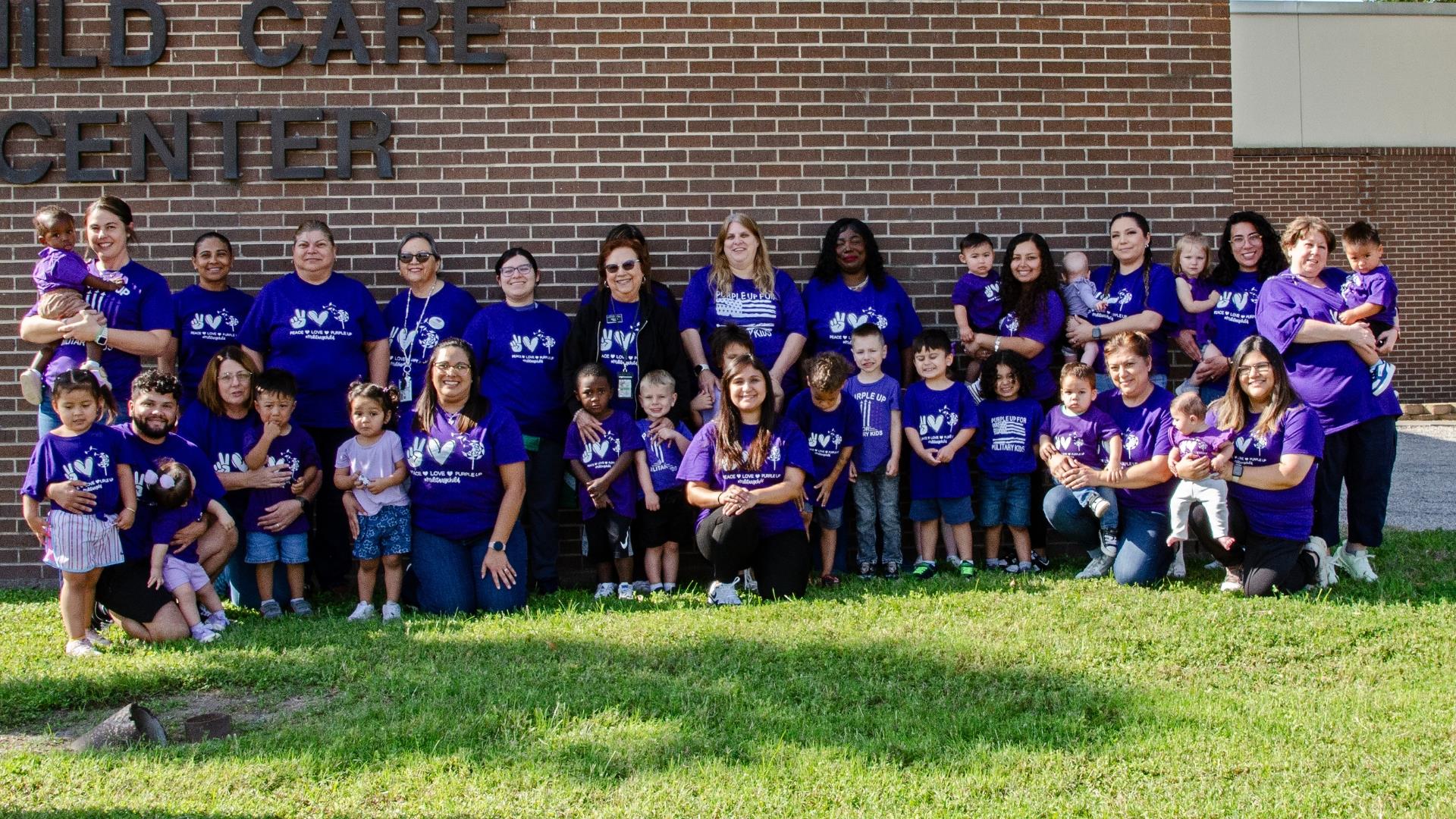 Children and providers dressed in purple to support military children.